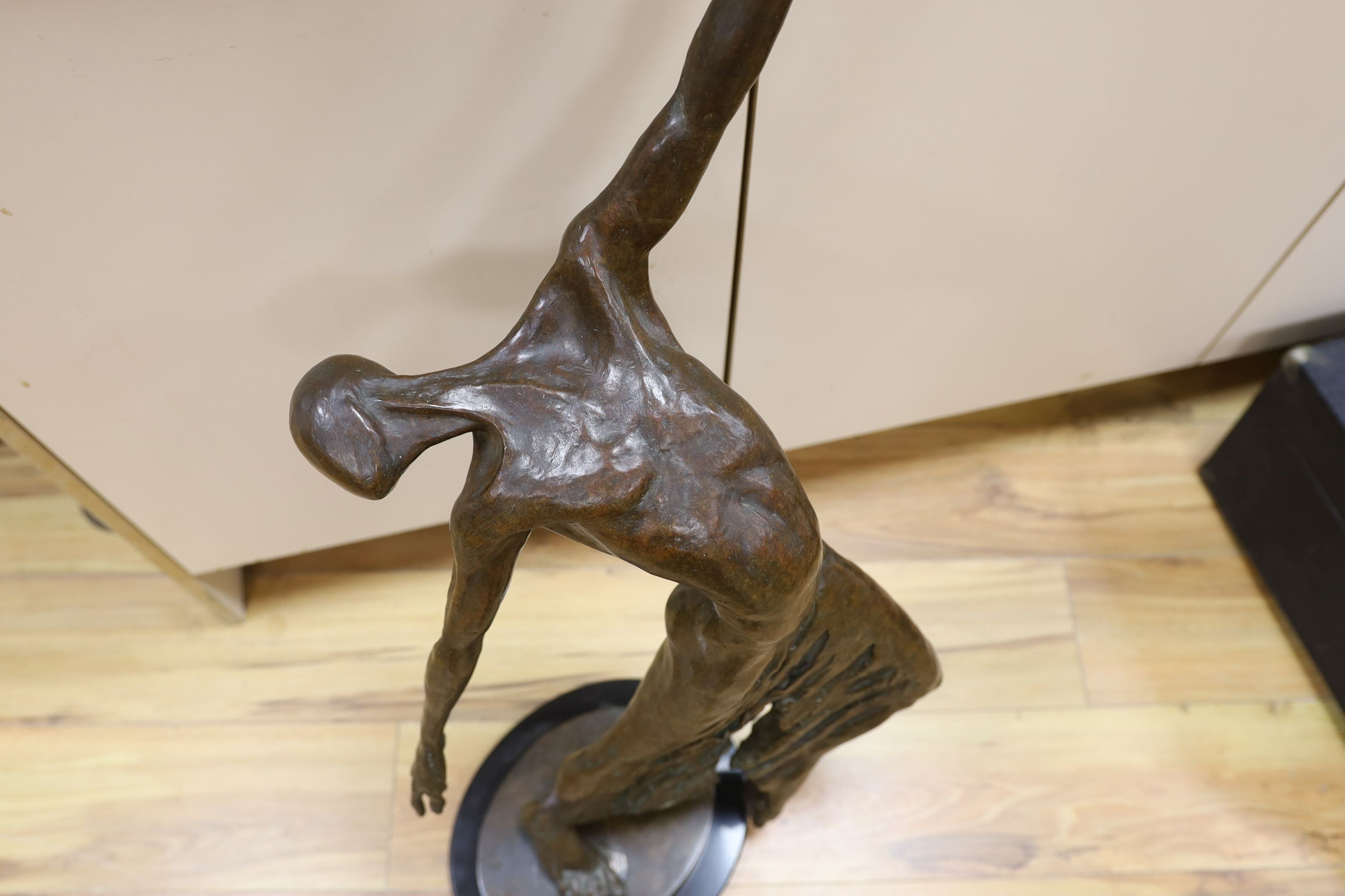 A large modern bronze of a male dancer, unsigned